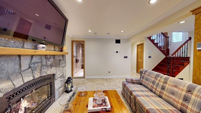 living room with baseboards, ornamental molding, recessed lighting, a fireplace, and stairs