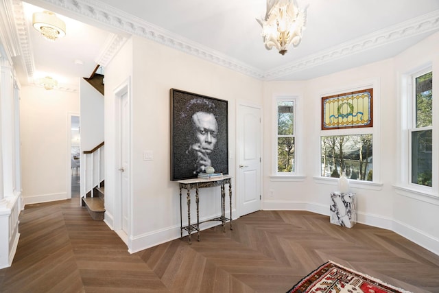56 Drake Rd, Scarsdale, NY 10583 - entryway with a chandelier, plenty of natural light, stairway, baseboards, and ornamental molding