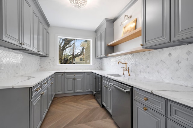 56 Drake Rd, Scarsdale, NY 10583 - kitchen with gray cabinetry, dishwasher, a sink, and light stone countertops