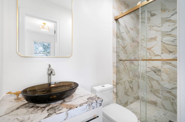 56 Drake Rd, Scarsdale, NY 10583 - full bathroom with a marble finish shower, vanity, and toilet