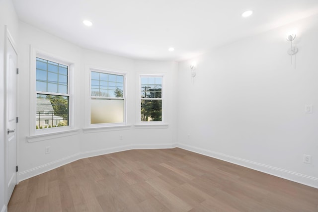 56 Drake Rd, Scarsdale, NY 10583 - empty room featuring light wood finished floors, recessed lighting, and baseboards