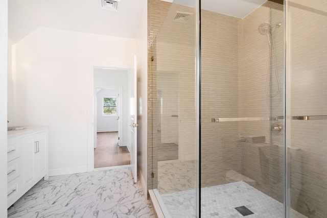 56 Drake Rd, Scarsdale, NY 10583 - bathroom with a stall shower, marble finish floors, and vanity