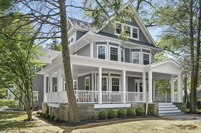 56 Drake Rd, Scarsdale, NY 10583 - view of front of house featuring a porch and a shingled roof