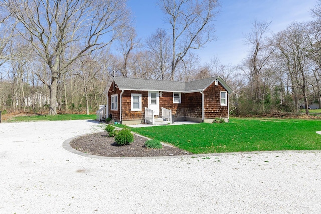 572A Montauk Hwy, Westhampton Beach, NY 11978 - view of front of property with gravel driveway and a front yard