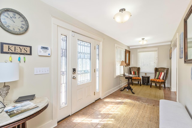 572A Montauk Hwy, Westhampton Beach, NY 11978 - foyer entrance featuring baseboards and light tile patterned floors