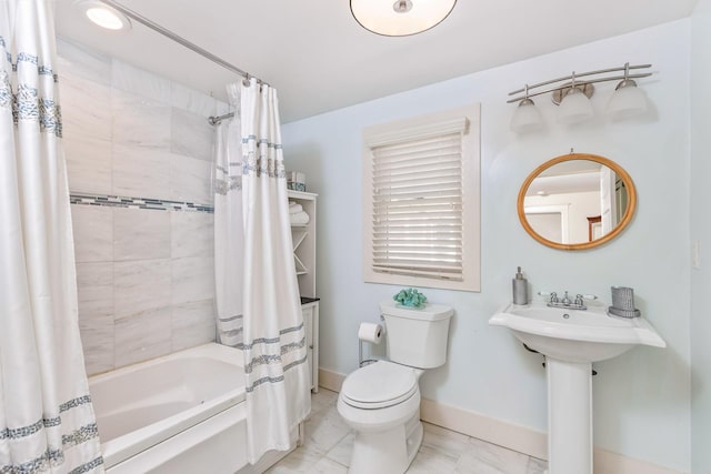 572A Montauk Hwy, Westhampton Beach, NY 11978 - bathroom with marble finish floor, shower / tub combo, toilet, and baseboards