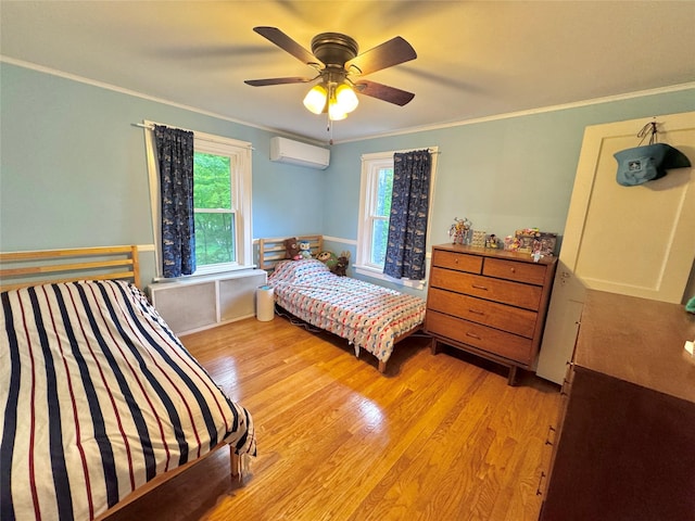 190 Union St, Montgomery, NY 12549 - bedroom with a wall mounted AC, light wood-style flooring, crown molding, and a ceiling fan