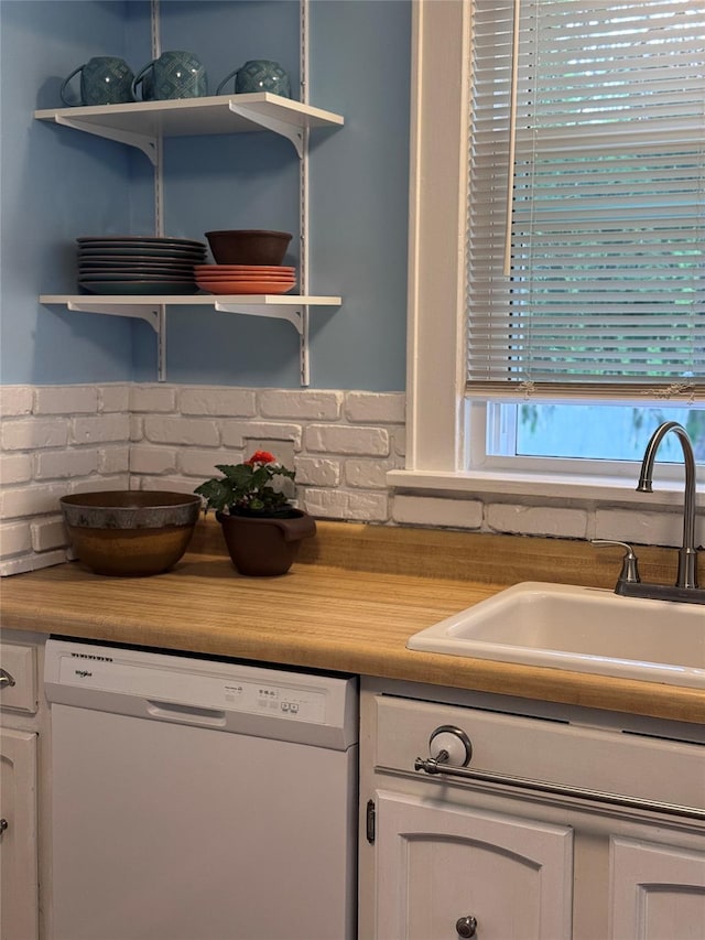 190 Union St, Montgomery, NY 12549 - kitchen featuring white dishwasher, open shelves, and white cabinets