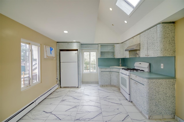 kitchen featuring a wealth of natural light, white appliances, wall chimney exhaust hood, and a baseboard heating unit