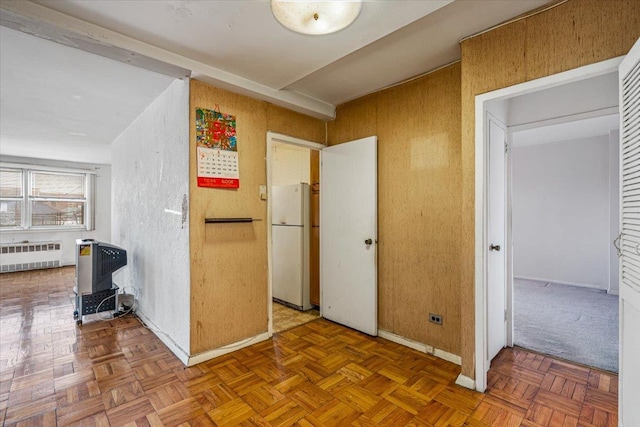 90-59 56th Ave Unit 2J, Elmhurst, NY 11373 - corridor with baseboards and radiator