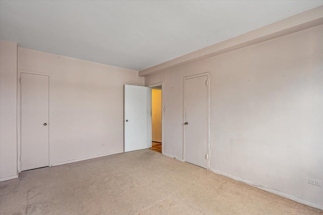 90-59 56th Ave Unit 2J, Elmhurst, NY 11373 - carpeted empty room featuring baseboards