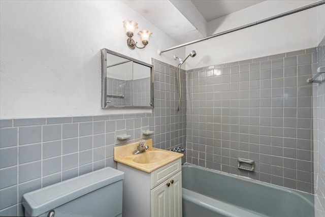 90-59 56th Ave Unit 2J, Elmhurst, NY 11373 - full bath featuring bathing tub / shower combination, vanity, toilet, and tile walls