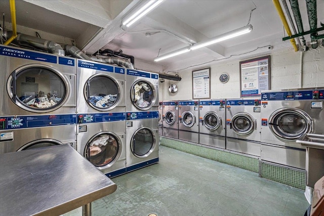 90-59 56th Ave Unit 2J, Elmhurst, NY 11373 - community laundry room featuring separate washer and dryer and stacked washer and clothes dryer
