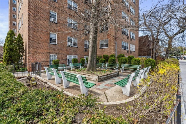 90-59 56th Ave Unit 2J, Elmhurst, NY 11373 - view of community featuring fence