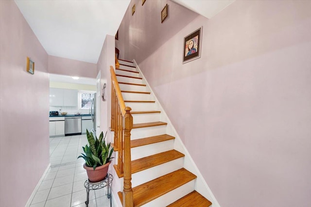 2559 Seymour Ave, Bronx, NY 10469 - staircase featuring baseboards and tile patterned floors