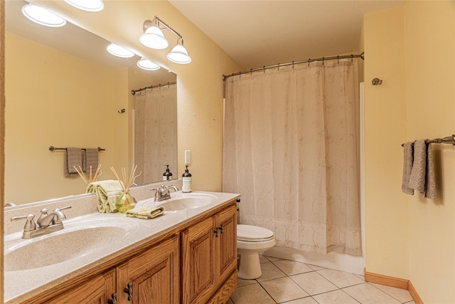 26 Cowboy Trl, Saugerties, NY 12477 - bathroom featuring tile patterned floors, double vanity, a sink, and toilet