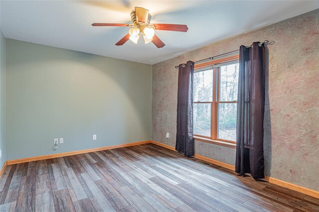 26 Cowboy Trl, Saugerties, NY 12477 - empty room featuring wood finished floors, ceiling fan, and baseboards