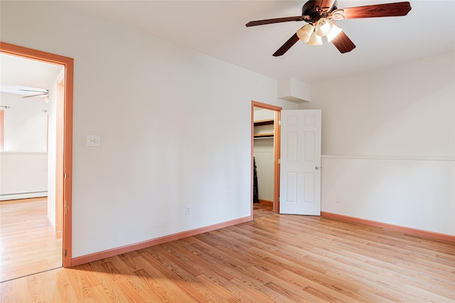 26 Cowboy Trl, Saugerties, NY 12477 - unfurnished room featuring ceiling fan, light wood-style floors, and baseboards