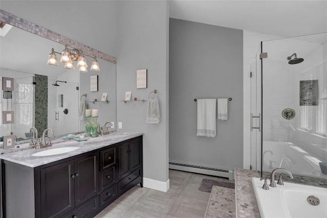 full bathroom featuring baseboard heating, a sink, and a shower stall