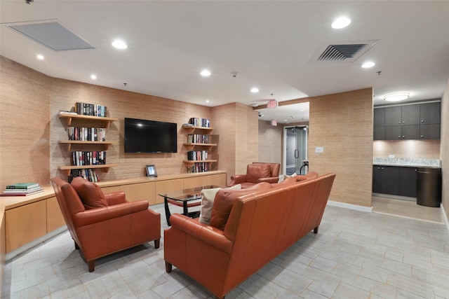 living room with visible vents and recessed lighting