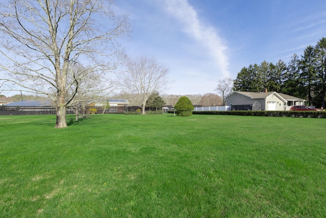 view of yard featuring fence