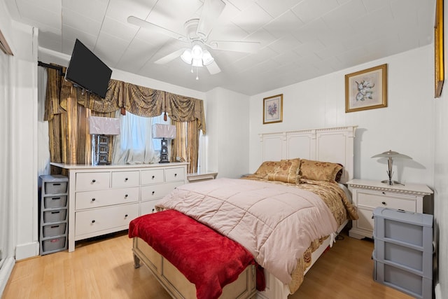 bedroom featuring ceiling fan and light wood-style floors