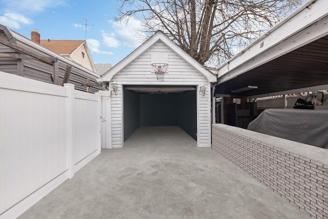 garage with fence
