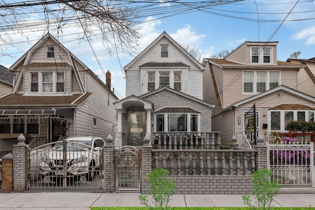 view of front facade with a gate and a fenced front yard