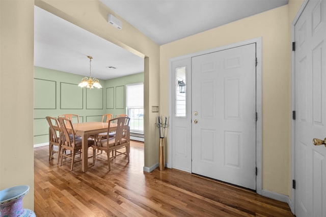 7 Center Cir, Florida, NY 10921 - entryway with wood finished floors and an inviting chandelier
