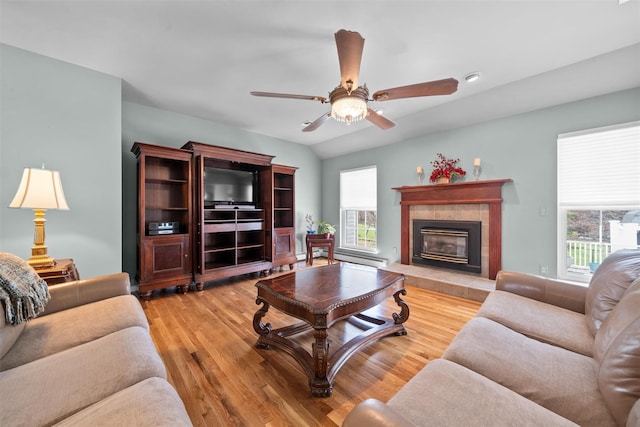 7 Center Cir, Florida, NY 10921 - living area featuring a fireplace, plenty of natural light, a ceiling fan, and wood finished floors