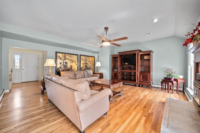 7 Center Cir, Florida, NY 10921 - living area featuring vaulted ceiling, light wood-type flooring, visible vents, and ceiling fan