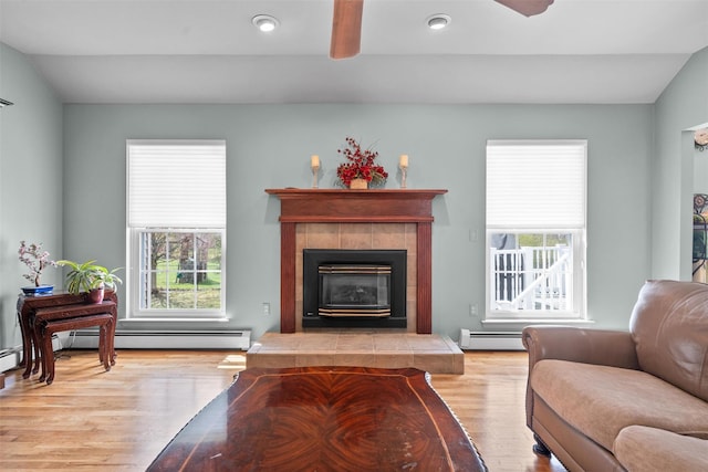 7 Center Cir, Florida, NY 10921 - living room featuring recessed lighting, a ceiling fan, wood finished floors, a tile fireplace, and a baseboard radiator