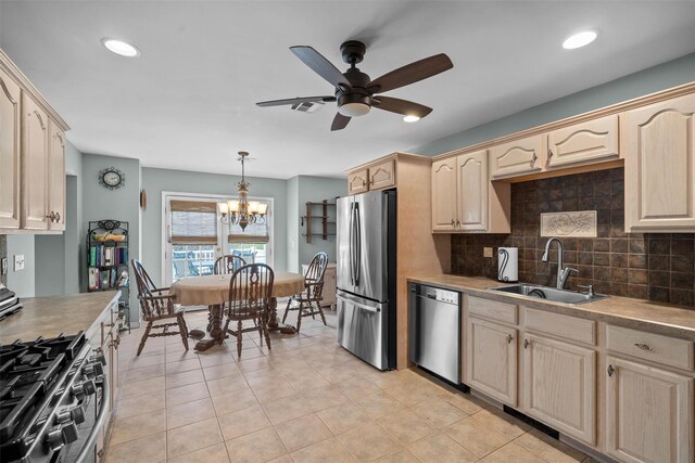 7 Center Cir, Florida, NY 10921 - kitchen featuring visible vents, a sink, tasteful backsplash, appliances with stainless steel finishes, and ceiling fan with notable chandelier
