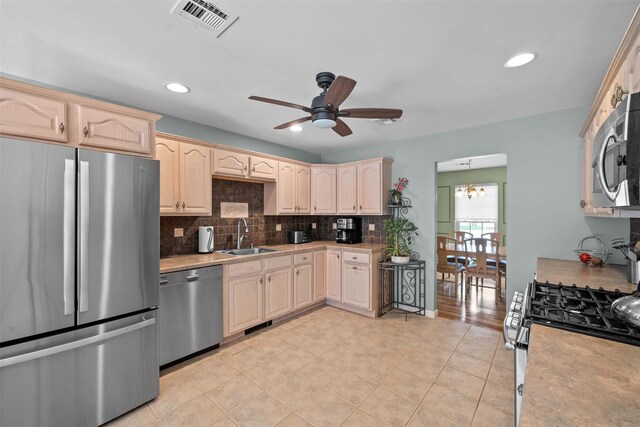 7 Center Cir, Florida, NY 10921 - kitchen with light countertops, ceiling fan with notable chandelier, appliances with stainless steel finishes, and a sink