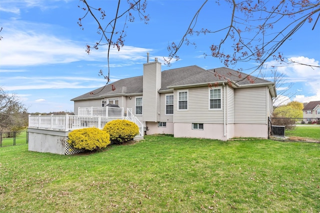 7 Center Cir, Florida, NY 10921 - rear view of property featuring a chimney, a wooden deck, fence, and a yard