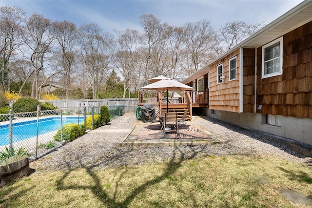 view of pool with a patio area, a fenced in pool, a deck, a gazebo, and fence