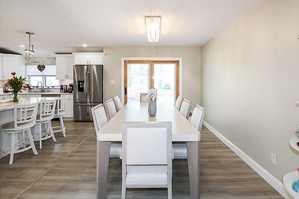 80 Lauren Ave, Dix Hills, NY 11746 - dining area featuring baseboards, recessed lighting, and dark wood finished floors