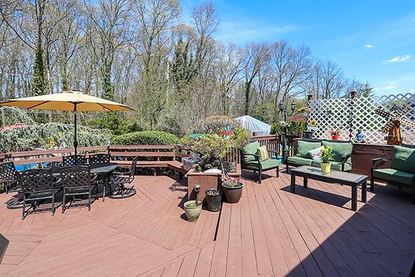 80 Lauren Ave, Dix Hills, NY 11746 - wooden terrace with an outdoor living space and outdoor dining area