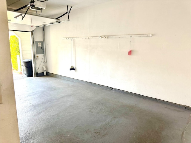 11 Theodore Dr, Coram, NY 11727 - garage with electric panel and a garage door opener