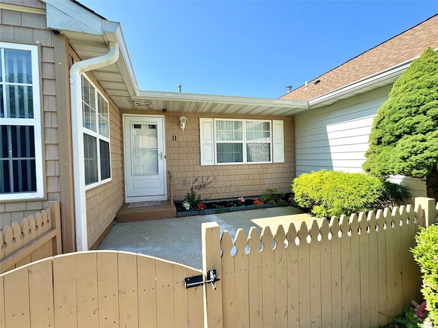 11 Theodore Dr, Coram, NY 11727 - doorway to property with a gate