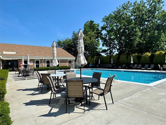 11 Theodore Dr, Coram, NY 11727 - community pool with a patio
