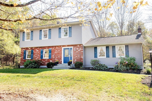 452 Hibernia Rd, Salt Point, NY 12578 - colonial home featuring a front yard and brick siding