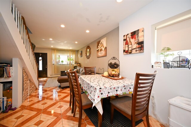 102-25 163rd Dr, Howard Beach, NY 11414 - dining space with a baseboard radiator, recessed lighting, and stairs