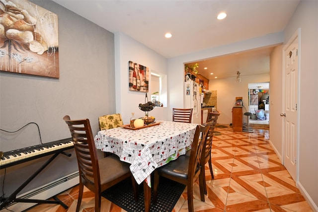 102-25 163rd Dr, Howard Beach, NY 11414 - dining room with recessed lighting, baseboard heating, and baseboards