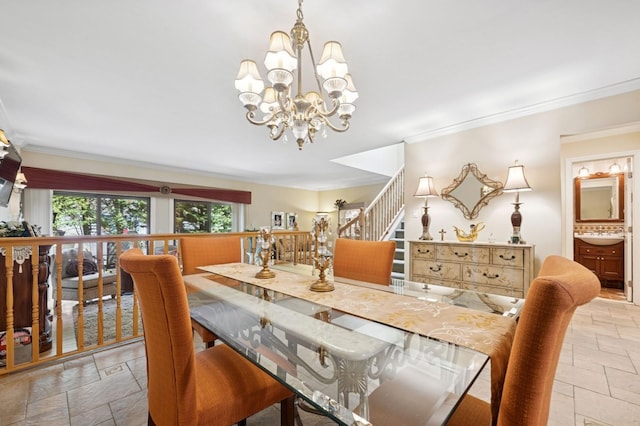 60 Southgate Cir, Massapequa Park, NY 11762 - dining space featuring a chandelier, stone tile floors, crown molding, and stairs