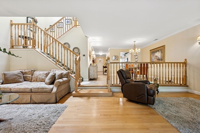 60 Southgate Cir, Massapequa Park, NY 11762 - living area featuring baseboards, crown molding, wood finished floors, and a chandelier