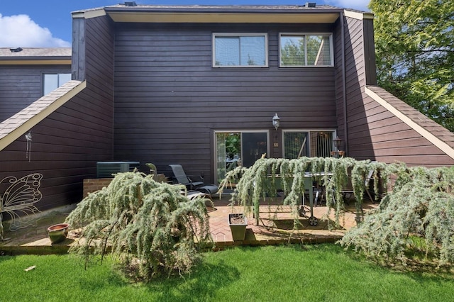 60 Southgate Cir, Massapequa Park, NY 11762 - back of house with a yard, central air condition unit, and a patio area