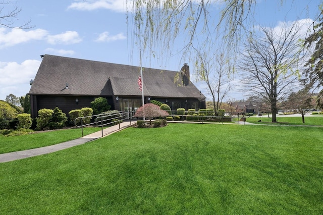 60 Southgate Cir, Massapequa Park, NY 11762 - view of front of property with a chimney and a front lawn