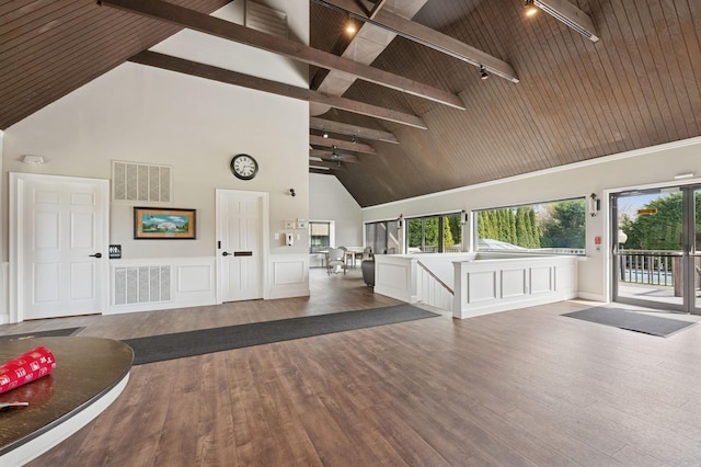 60 Southgate Cir, Massapequa Park, NY 11762 - living room with rail lighting, wood finished floors, visible vents, and high vaulted ceiling