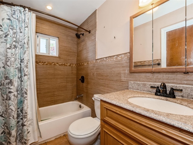 915 Derrick Adkins Ln, West Hempstead, NY 11552 - full bathroom featuring tile walls, shower / tub combo with curtain, toilet, and vanity